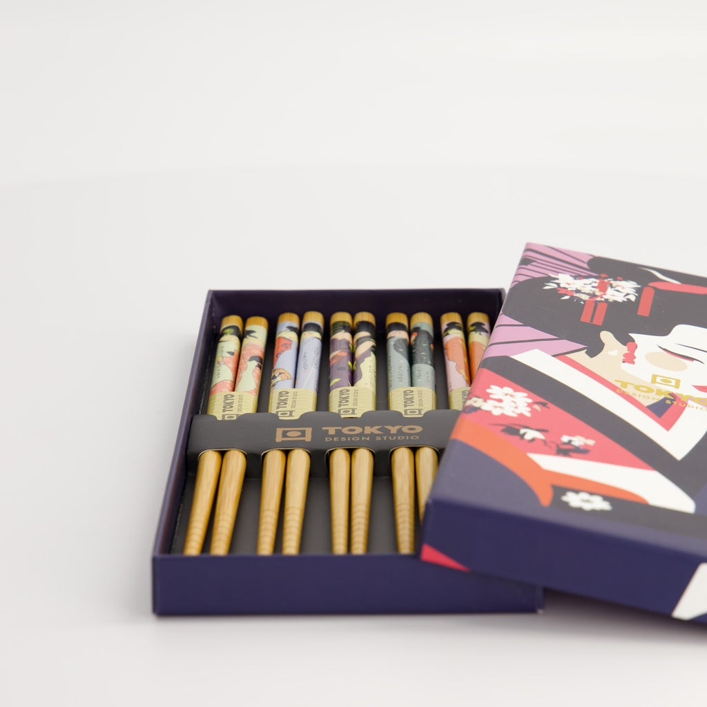 Set of chopsticks in a decorative box with 'Tokyo' branding on a light gray background