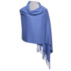 Blue scarf with fringe on a white background