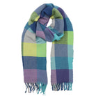 Multicolored striped scarf with fringes on a white background