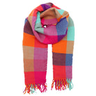 Multicolored striped scarf with fringes on a white background