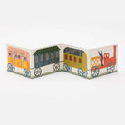Colorful train model with cartoon-like design on a white background