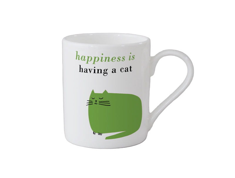 White mug with green cat illustration and text 'happiness is having a cat' on a gray background