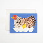 Card with a chicken and chick design on a blue background
