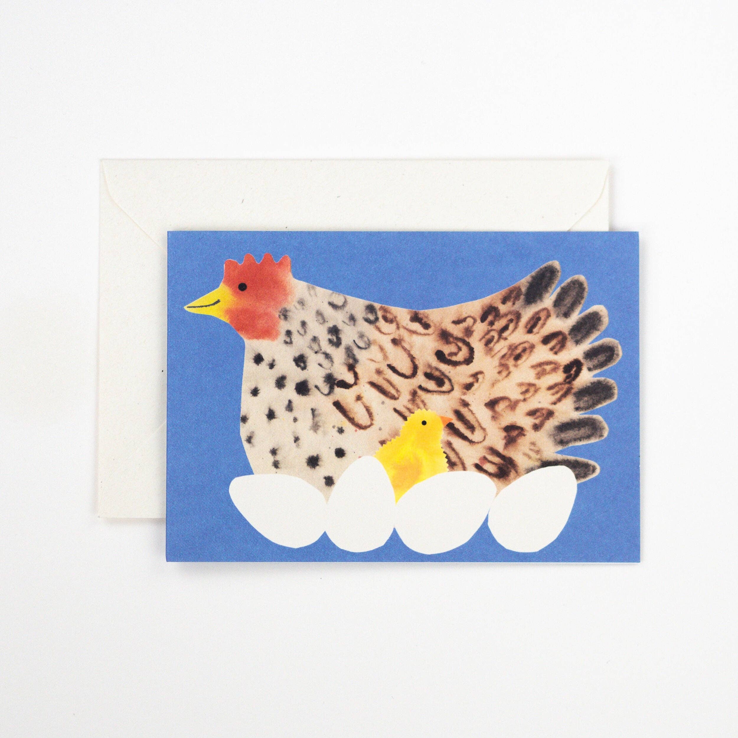 Card with a chicken and chick design on a blue background