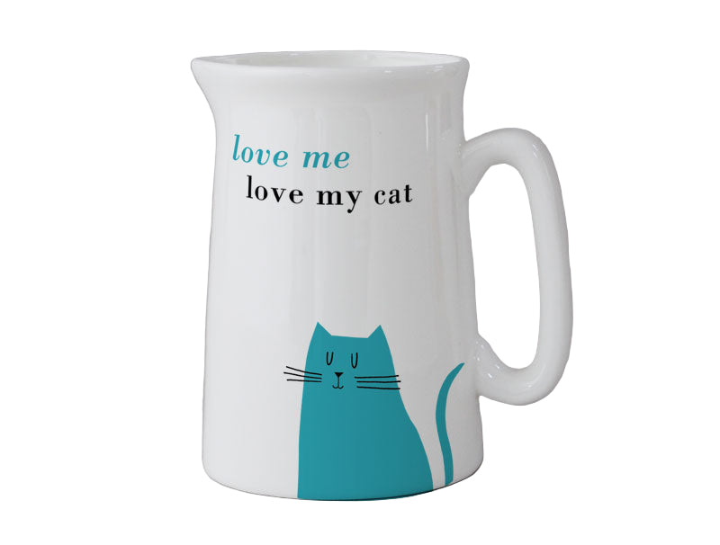 White mug with teal cat illustration and text 'love me love my cat' on a gray background