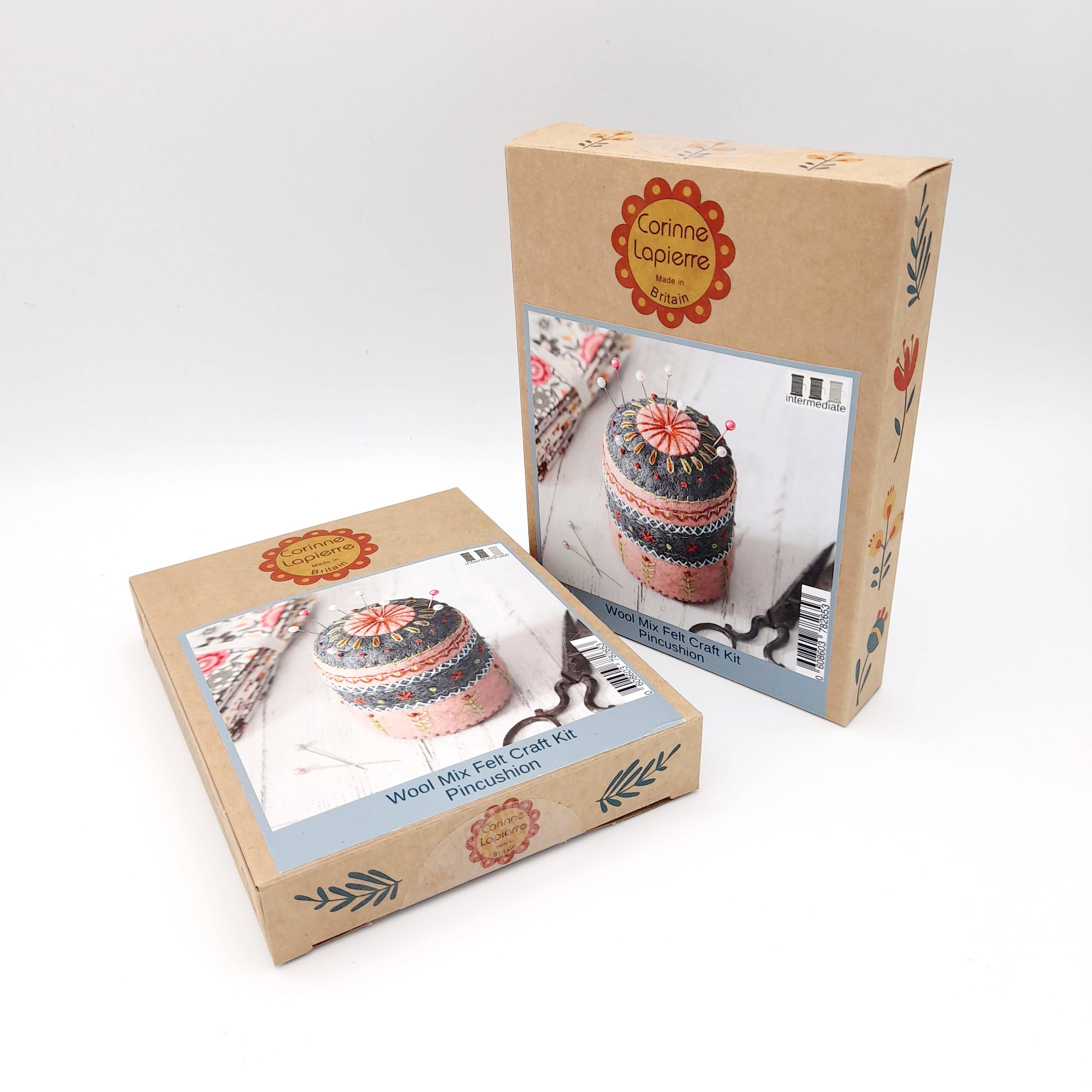 Two cardboard boxes with images of a woven item and branding on a white background