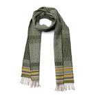 Green patterned scarf with fringes on a white background