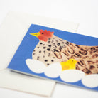 Notebook with a chicken and eggs illustration on a blue background