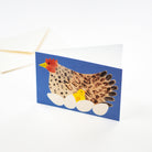 Card with a chicken and chick illustration on a blue background