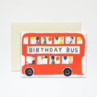 Birthday card with illustration of a red bus and 'Birthday Bus' text, featuring various people and balloons.