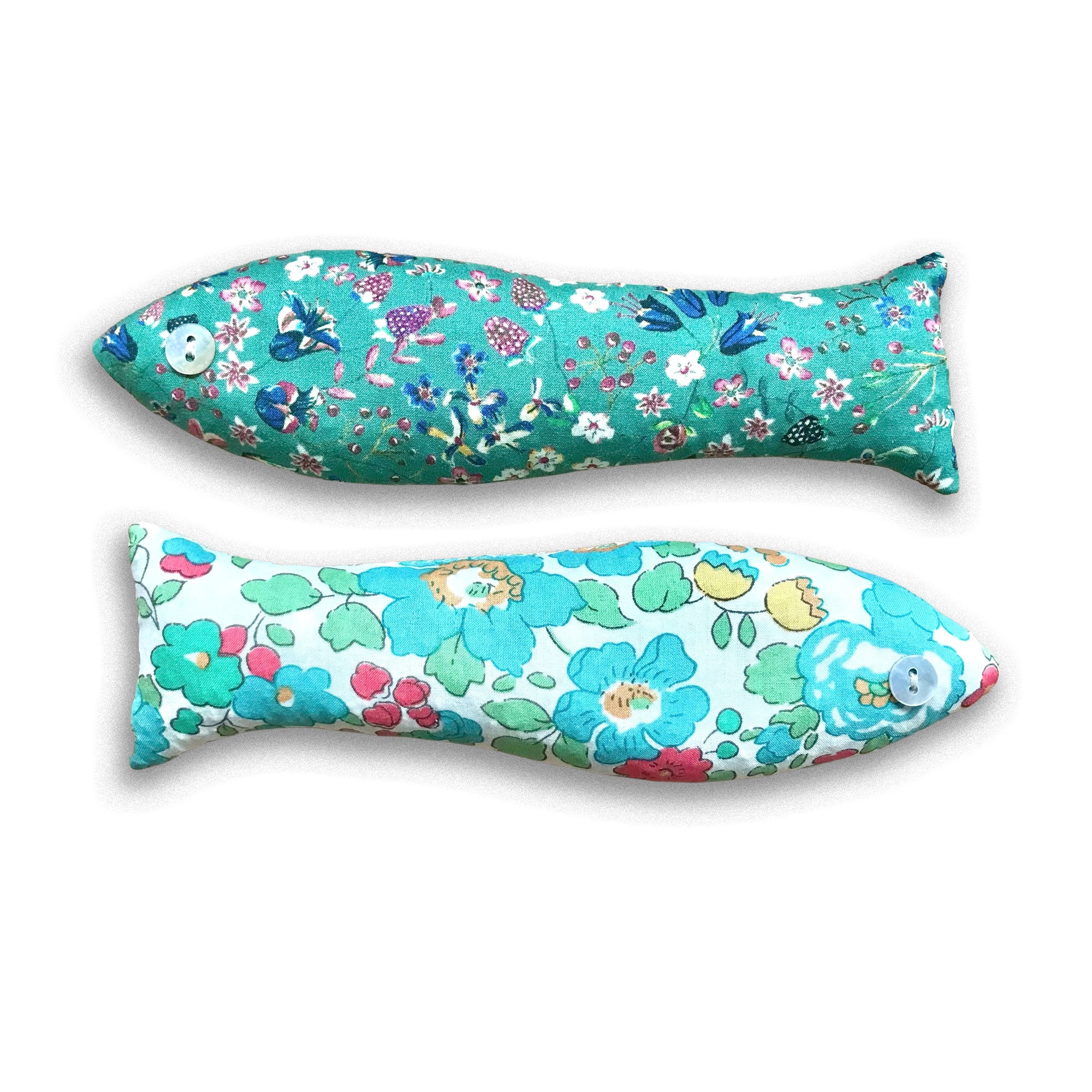 Two floral-patterned fish-shaped sachets on a white background
