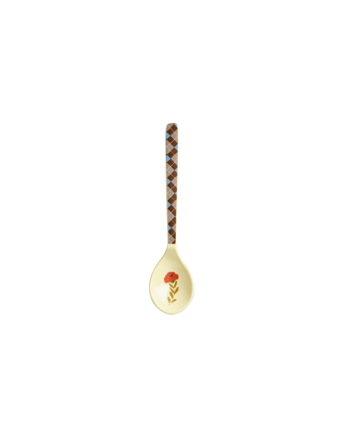 Decorative spoon with a floral and checkered design on a white background