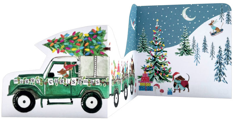 Christmas-themed card with a green truck and trees, featuring 'Merry Christmas' text.