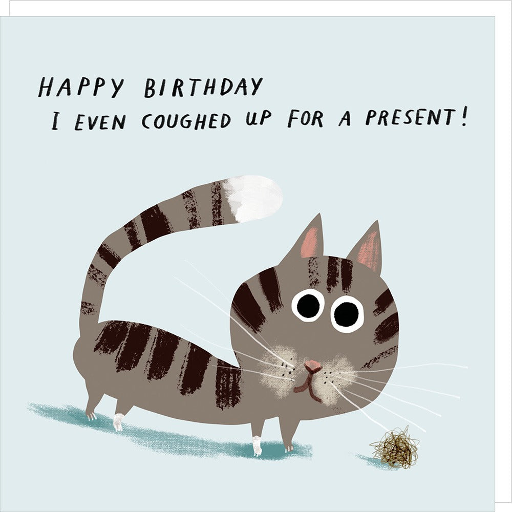 Cartoon cat with a present on a light blue background, with text 'Happy Birthday I even coughed up for a present!'.