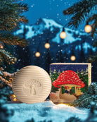 Decorative mushroom-shaped lanterns with a snowy mountain and tree background