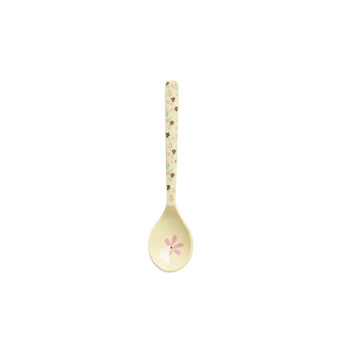 Decorative spoon with a floral design on a white background