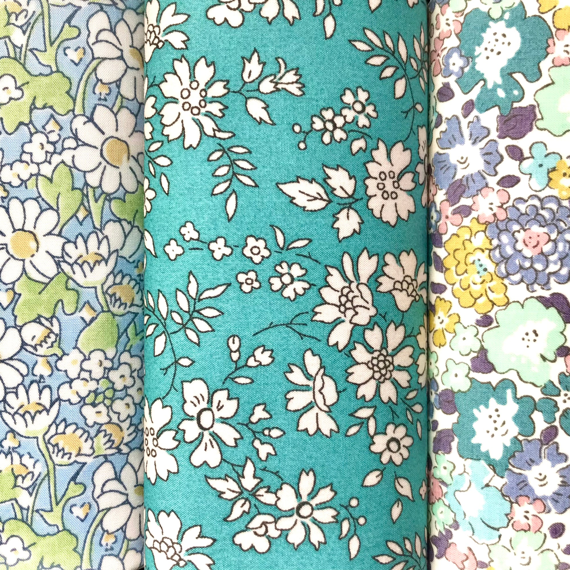 Three floral hankies made from Liberty Tana Lawn cotton