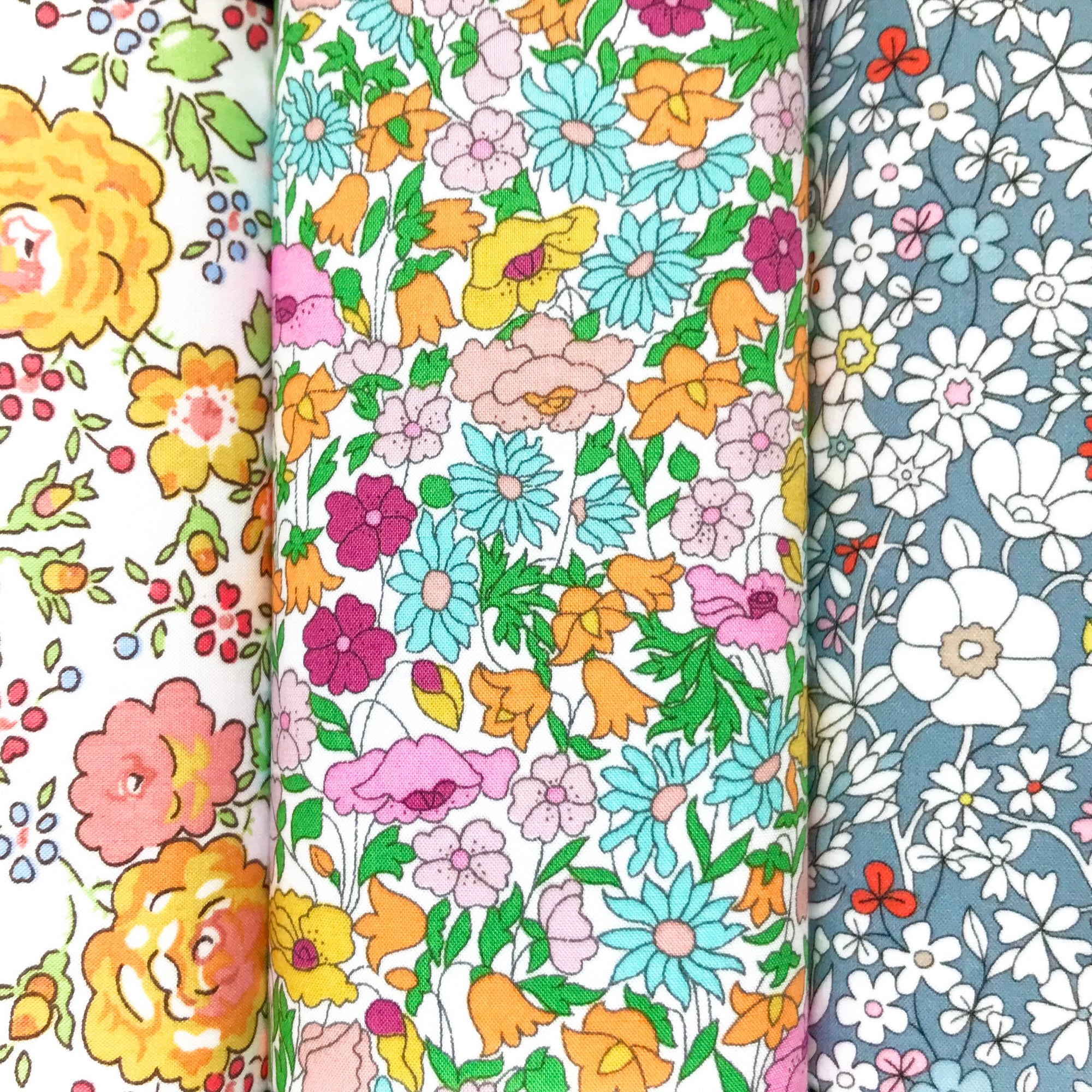 Three yellow and orange floral cotton hankies