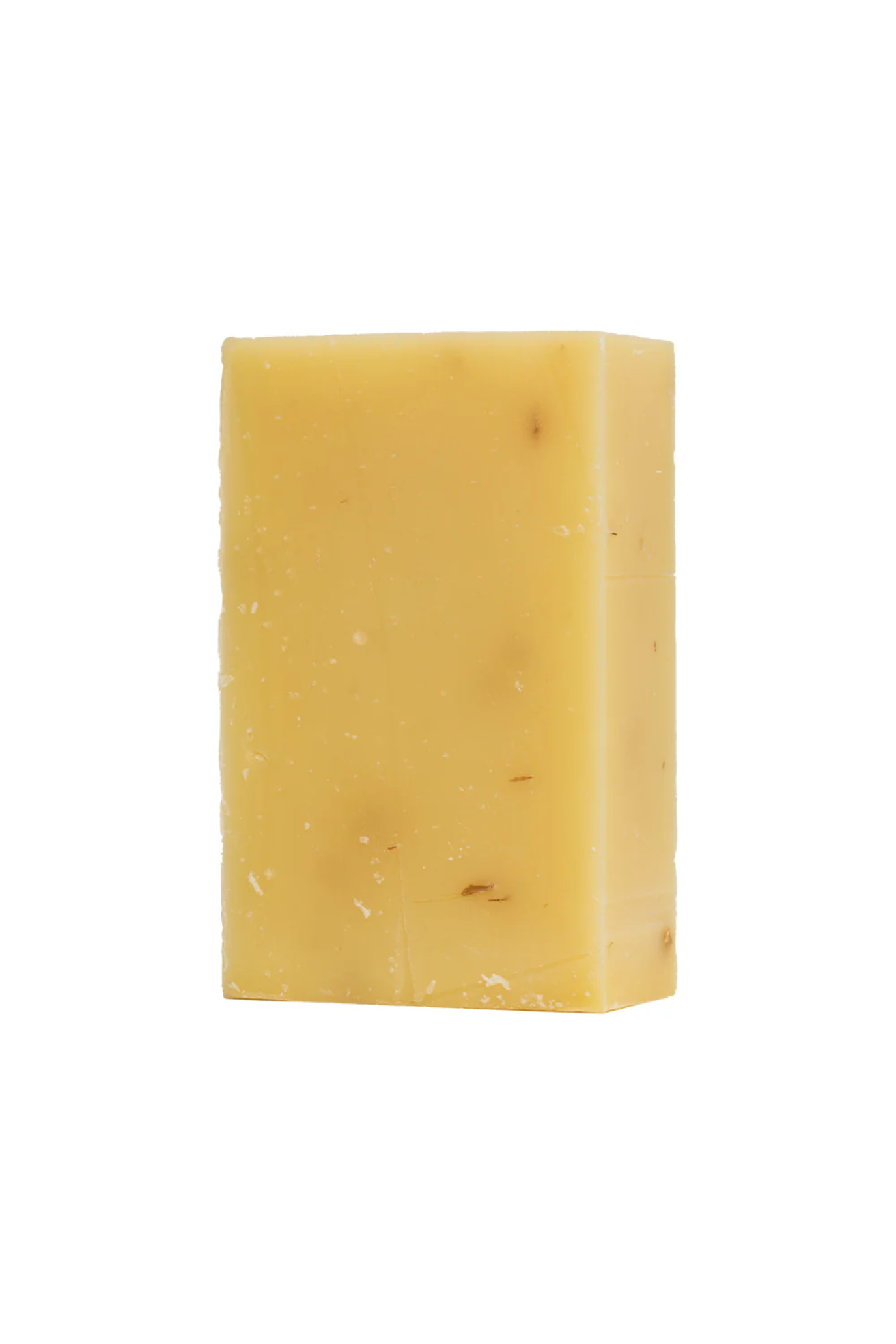 Yellow bar of soap on a white background