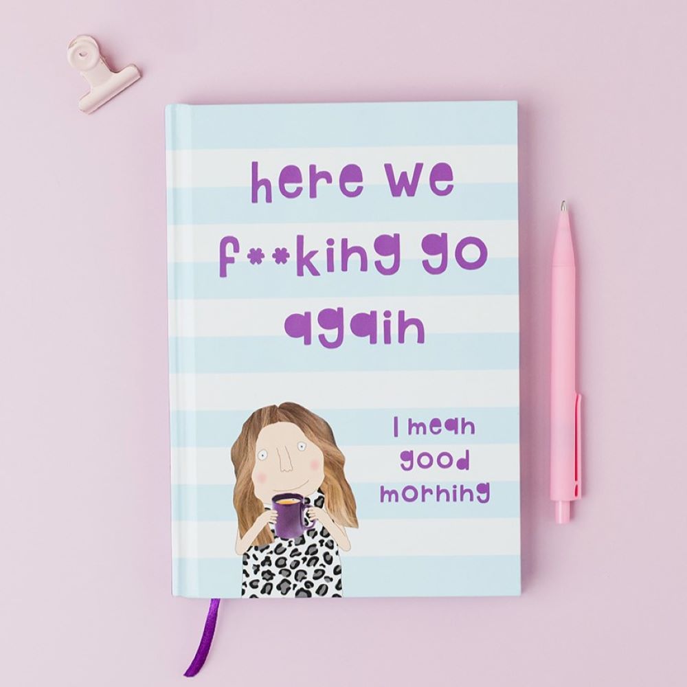 Notebook with a humorous illustration and text on a pink background