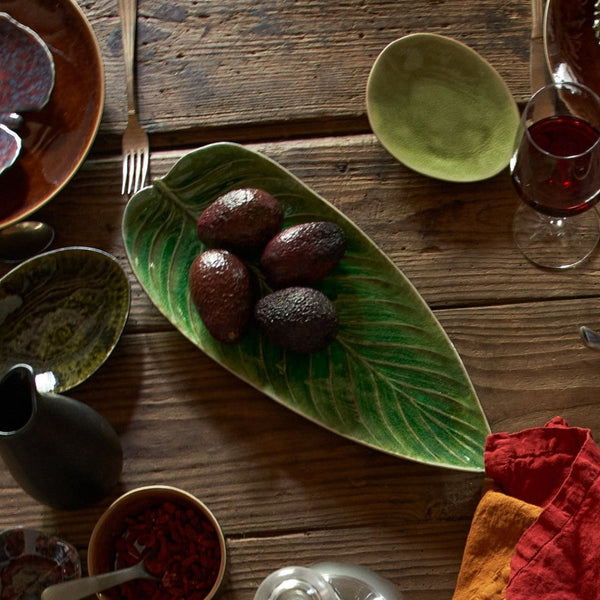 Dishes with food on a wooden table