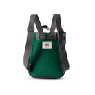 Green backpack with black straps on a white background