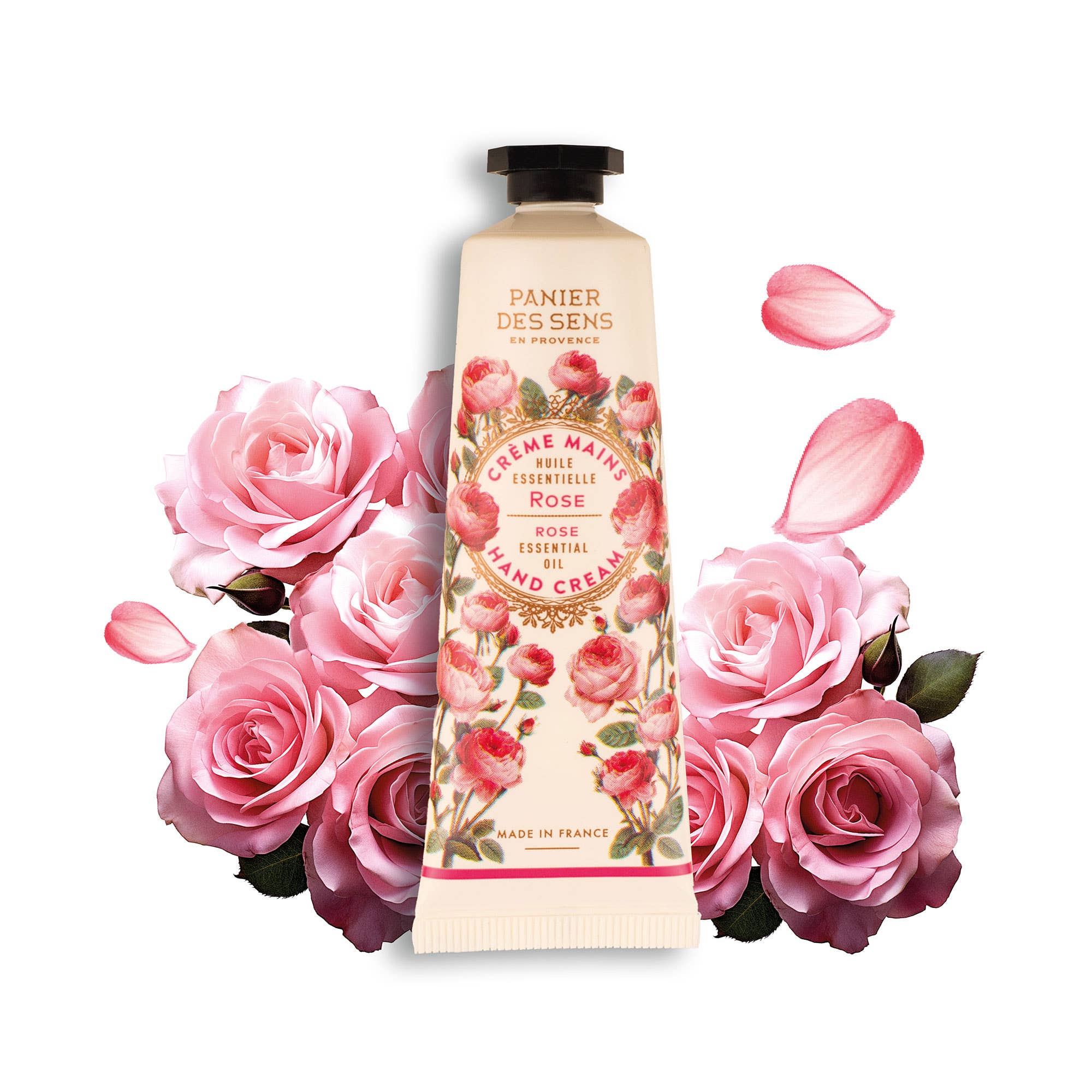 Hand cream with floral design surrounded by pink roses on a white background