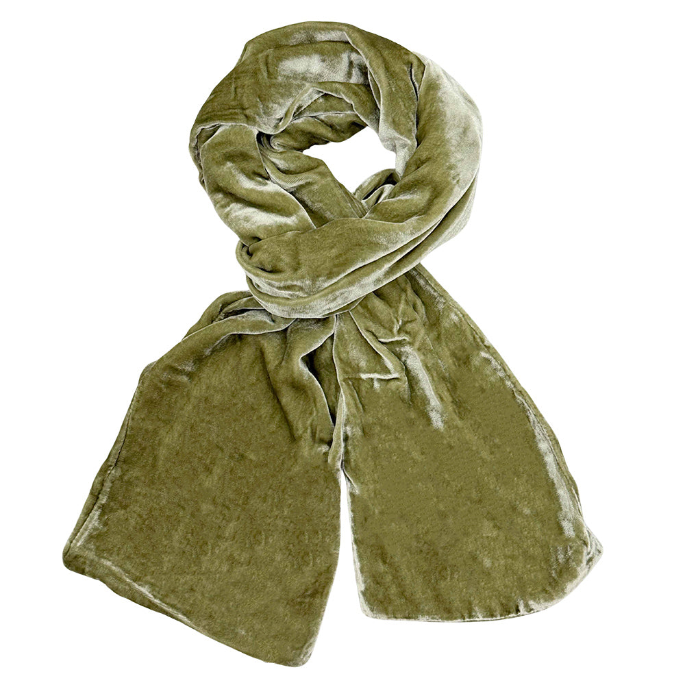 Green velvet scarf on a white background