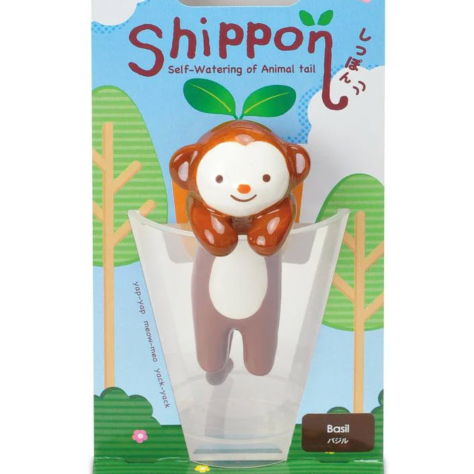 Packaging of a self-watering plant pot with a monkey design on a white background