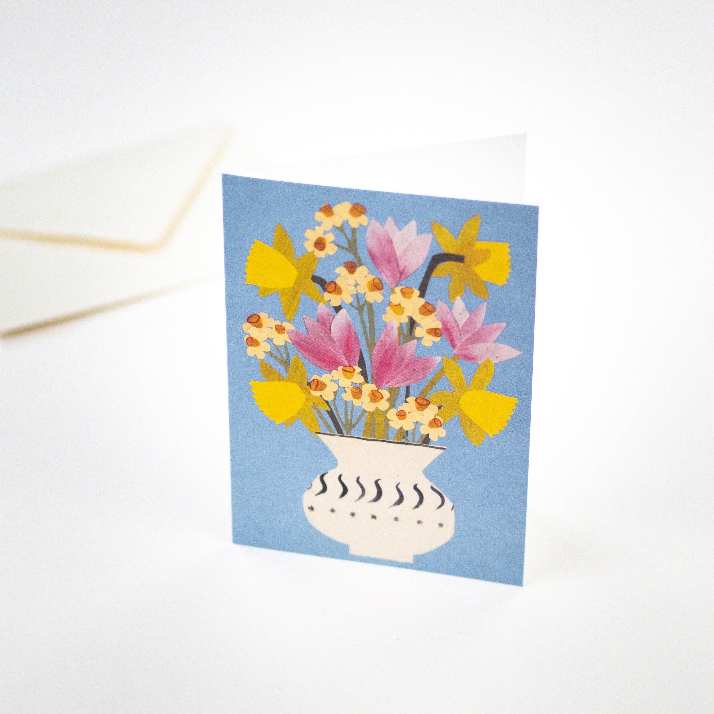 Card with a floral design on a blue background