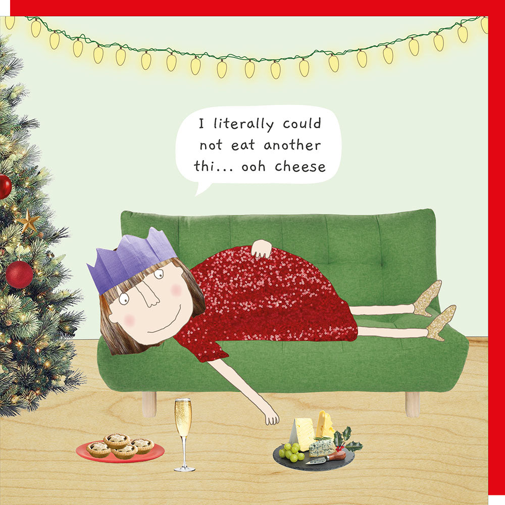 Illustration of a person on a couch next to a Christmas tree with food and wine, expressing they could not eat another thing.