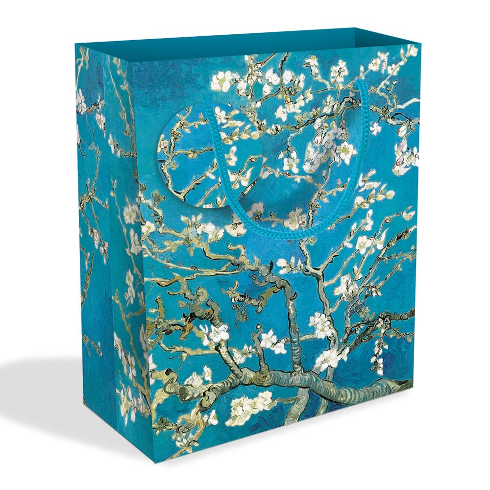 Short rectangular gift bag with white blossom against a blue background