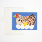 Card with a chicken and chick design on a blue background