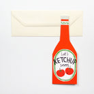 Ketchup bottle-shaped card with envelope on a white background