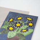 Greeting card with floral design on a blue background