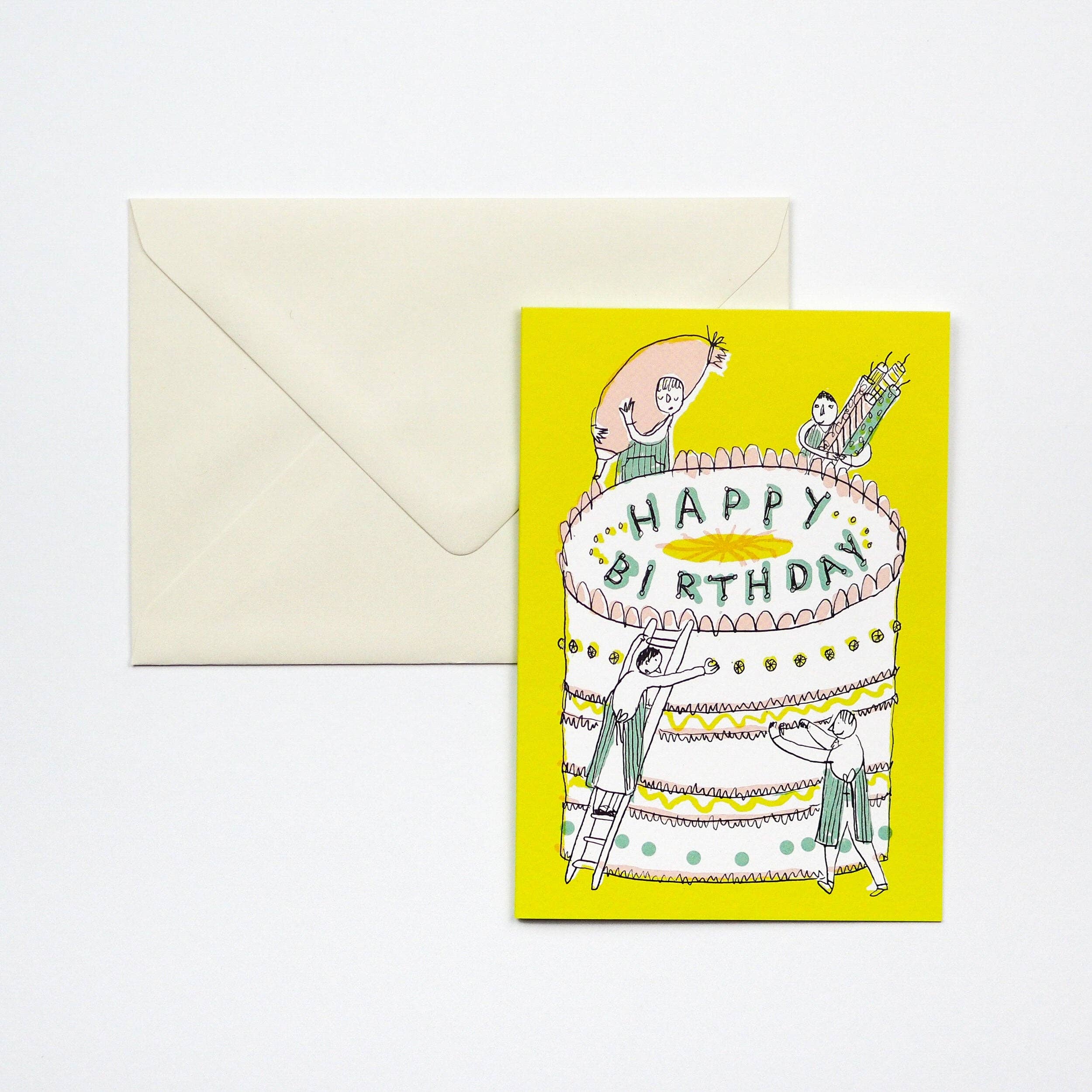 Birthday card with illustration of people on a cake and envelope on a white background