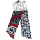 Two patterned scarves with a 'Les Belles Echarpes' tag on a white background