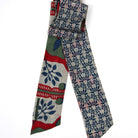 Colorful patterned fabric with floral design on a white background