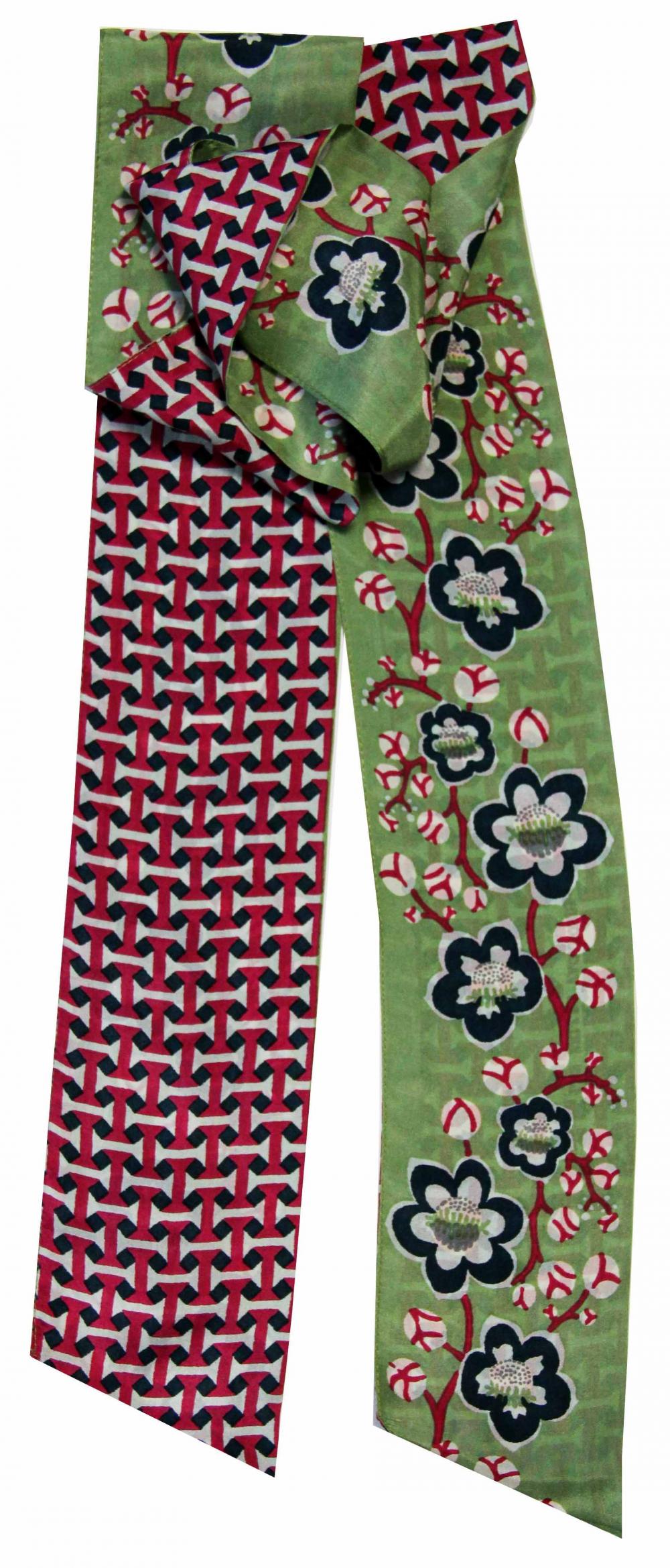 Scarf with geometric pattern and floral design on a green background