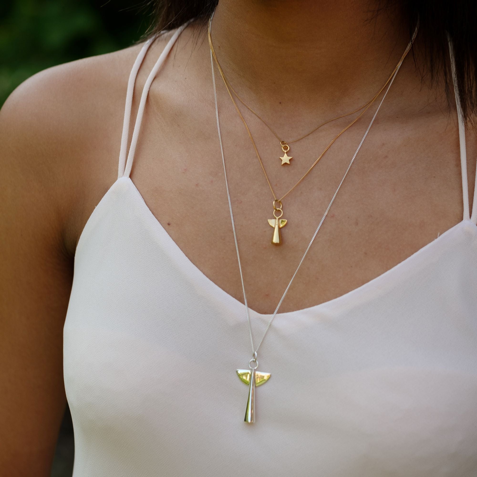 two angels and a star necklace