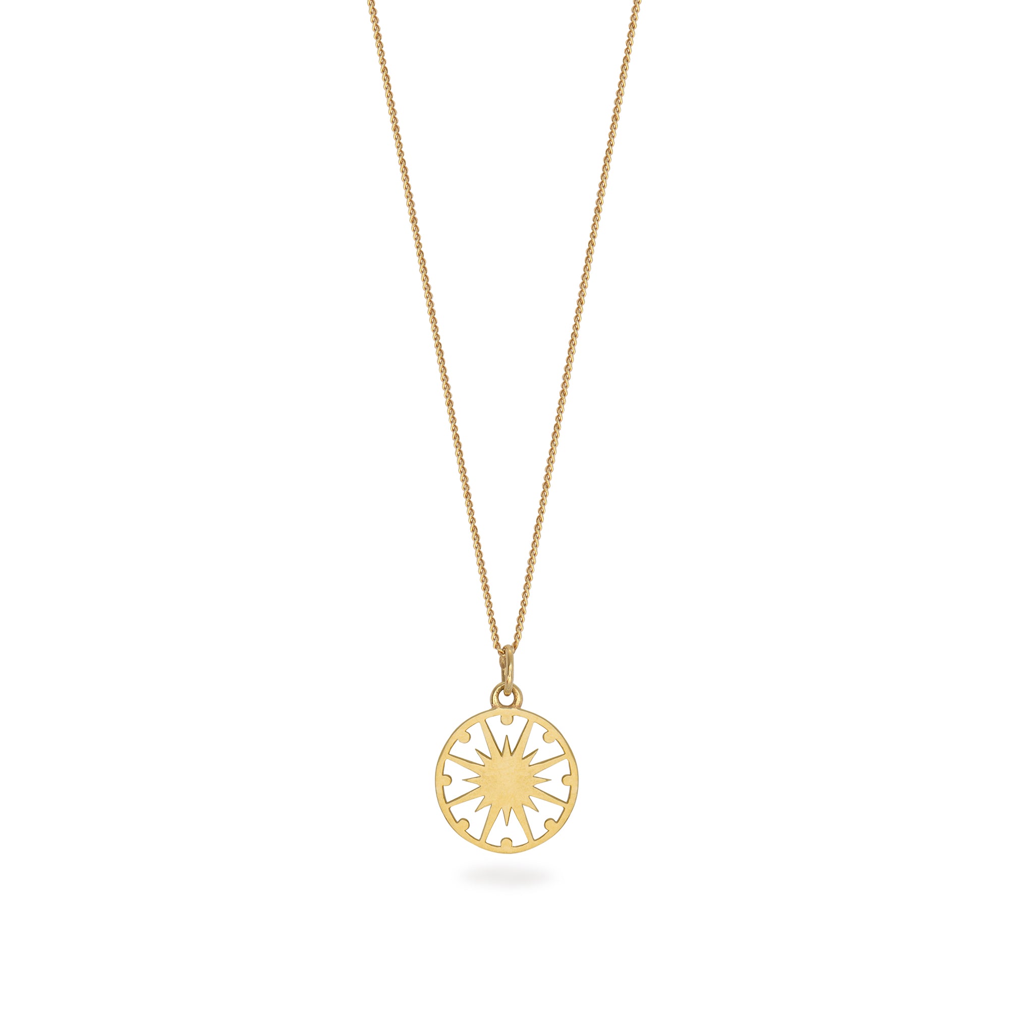 gold supernova necklace on white background