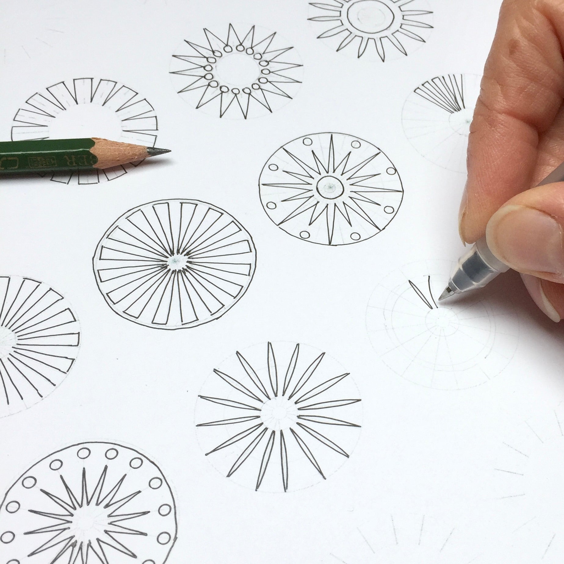 drawing token earrings