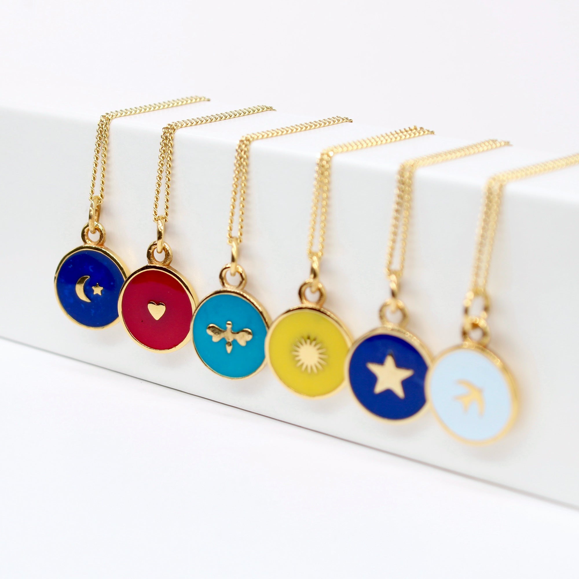 different styles of enamel necklaces