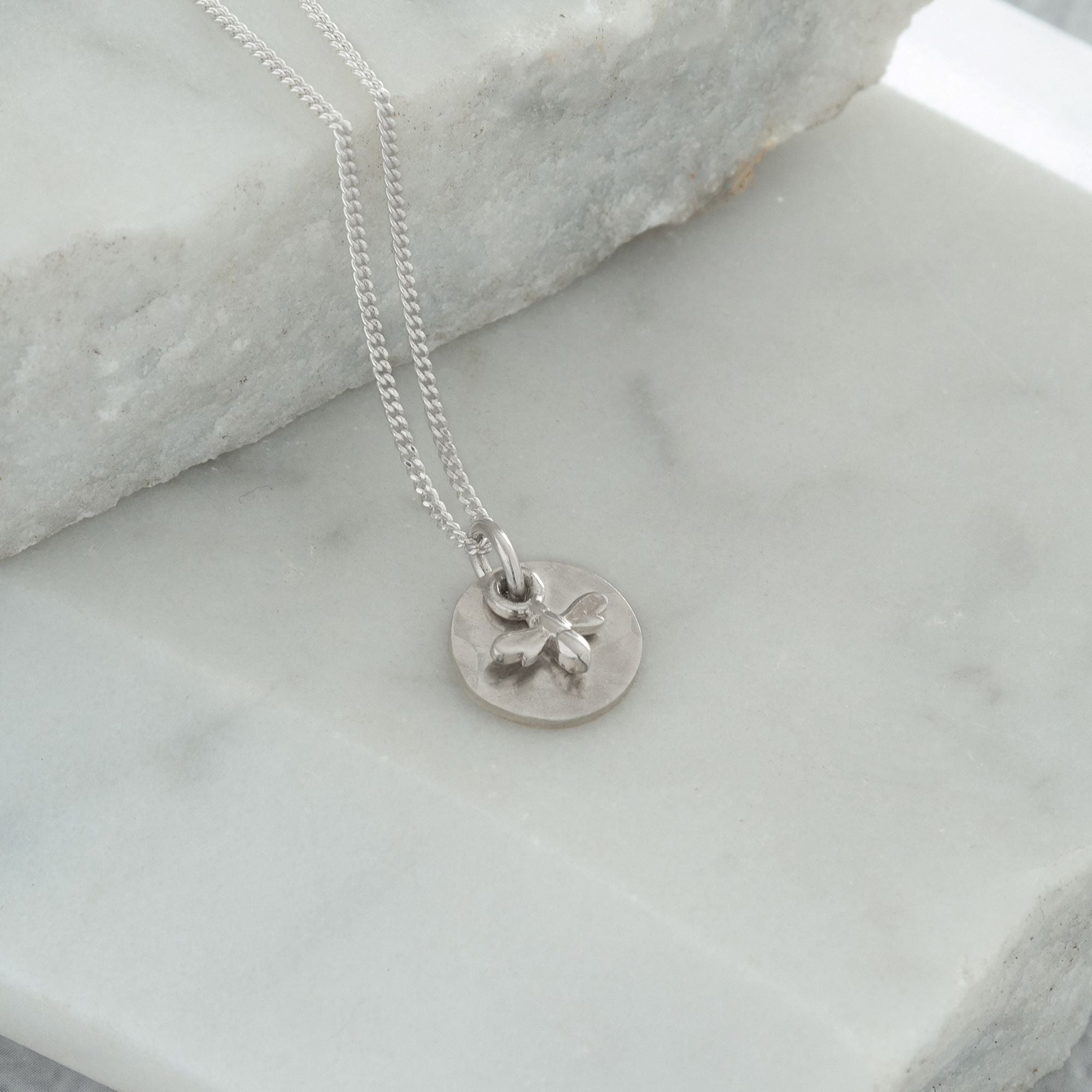 mini bee on hammered disc