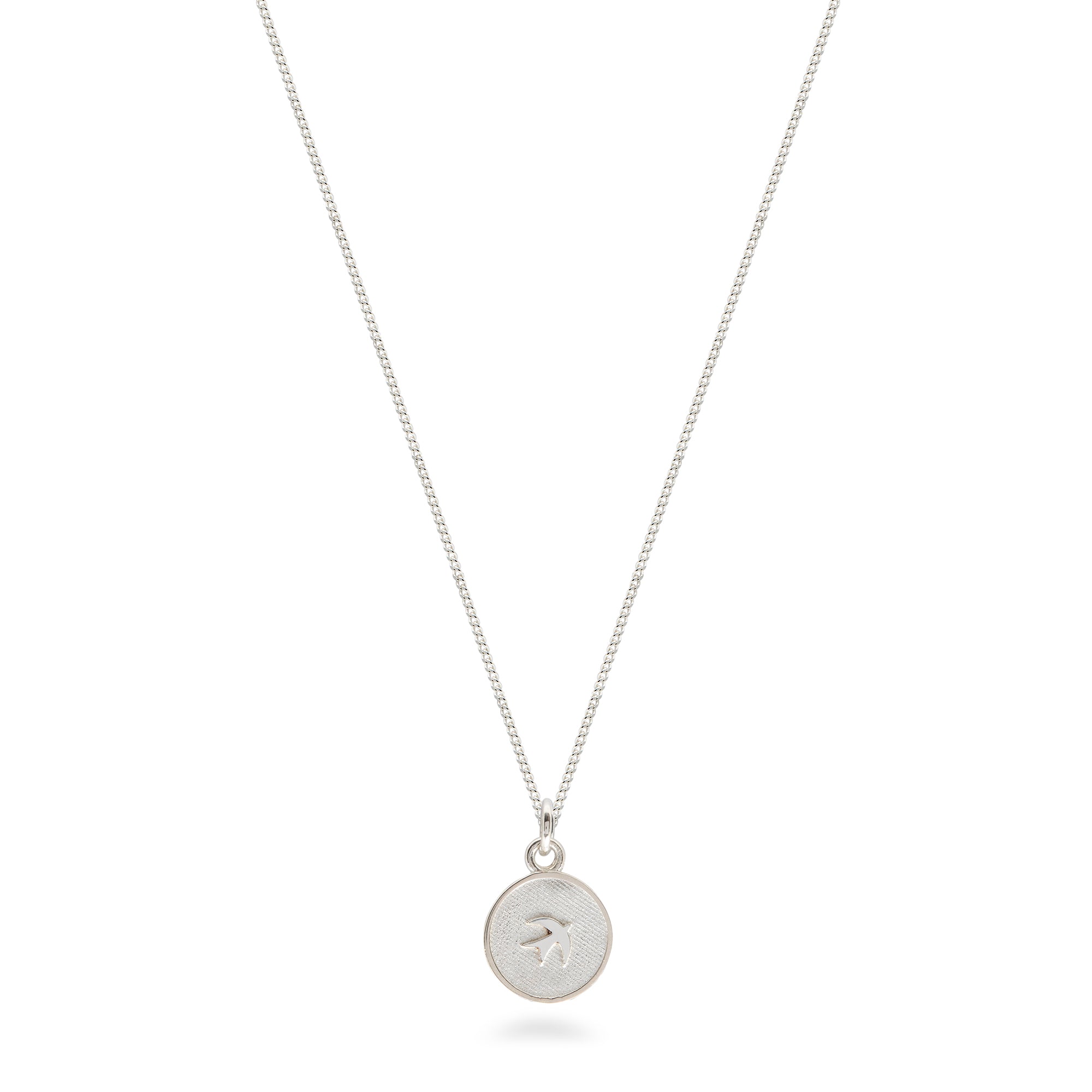 silver medallion swallow design