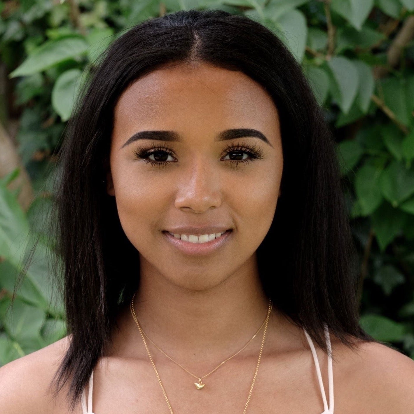 Solid gold bird necklace