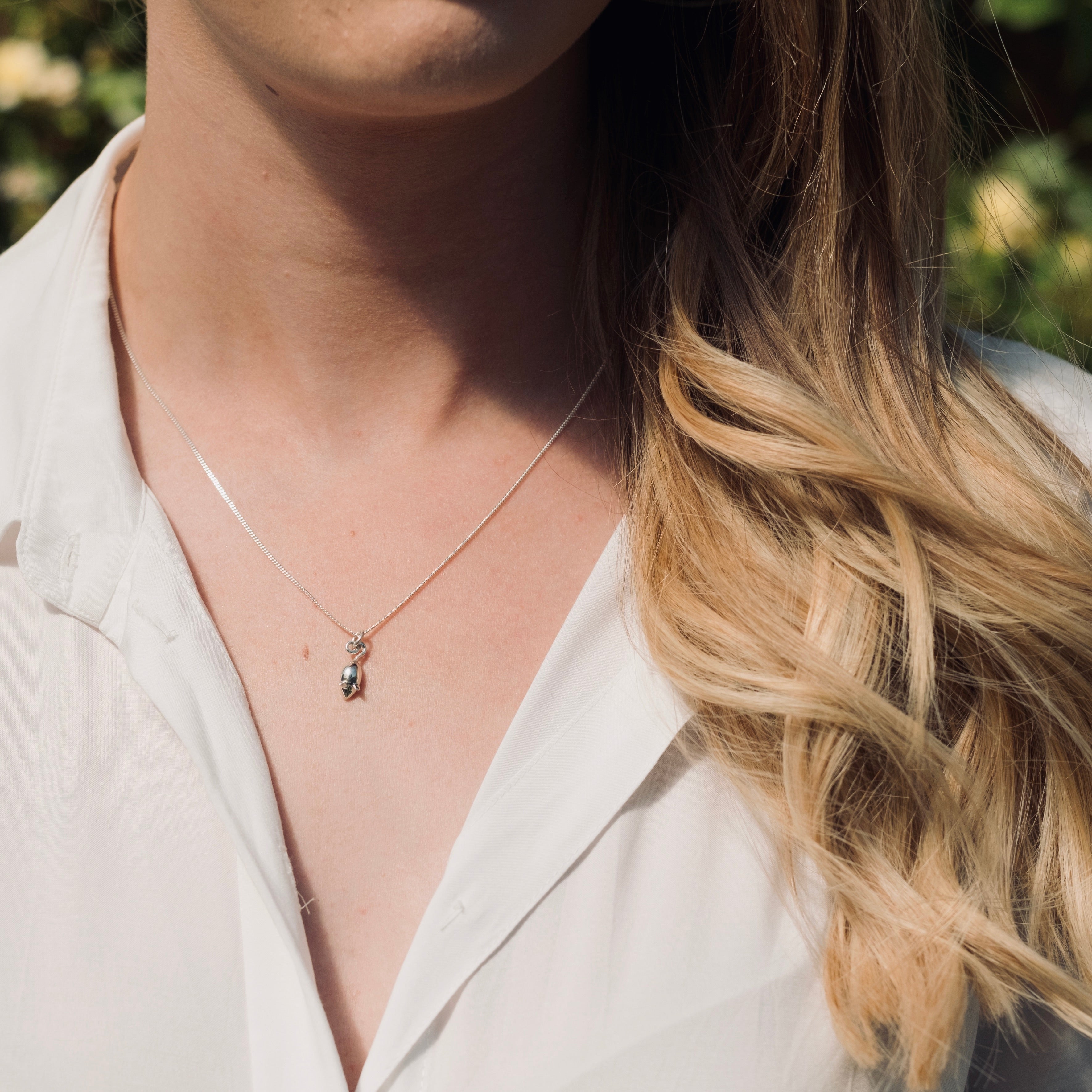 tint mouse pendant on a curb necklace chain