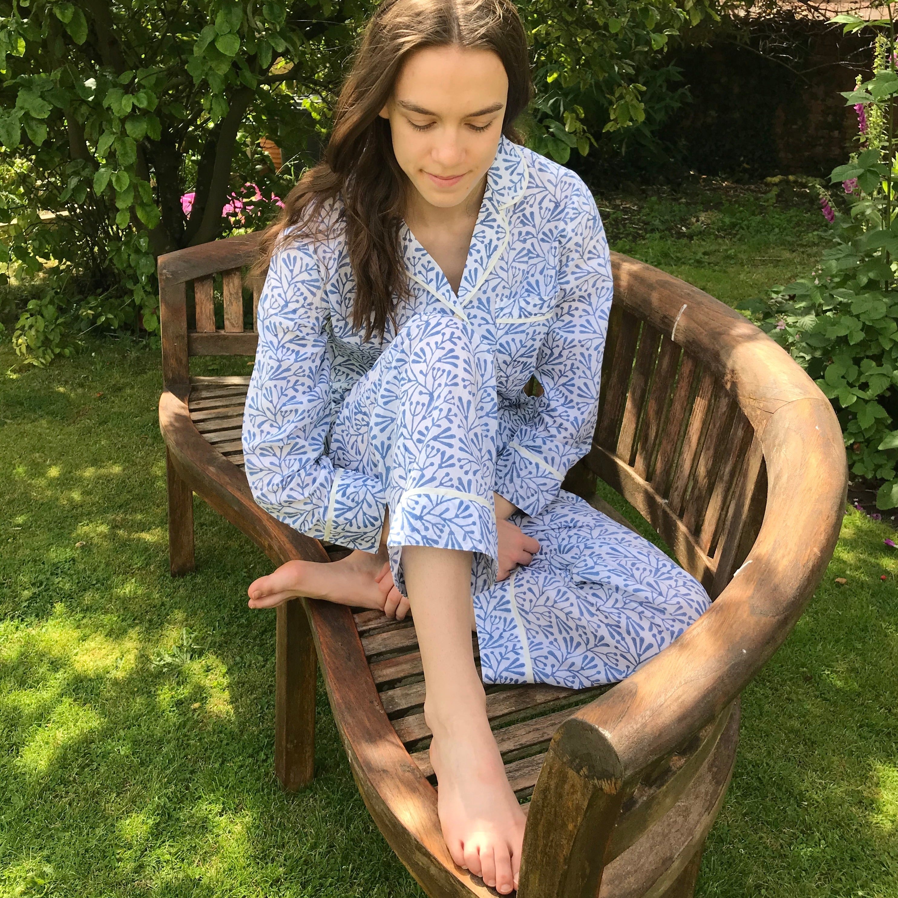 cotton pyjama set sitting on wooden bench