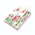 Floral notebook with a pink border on a white background