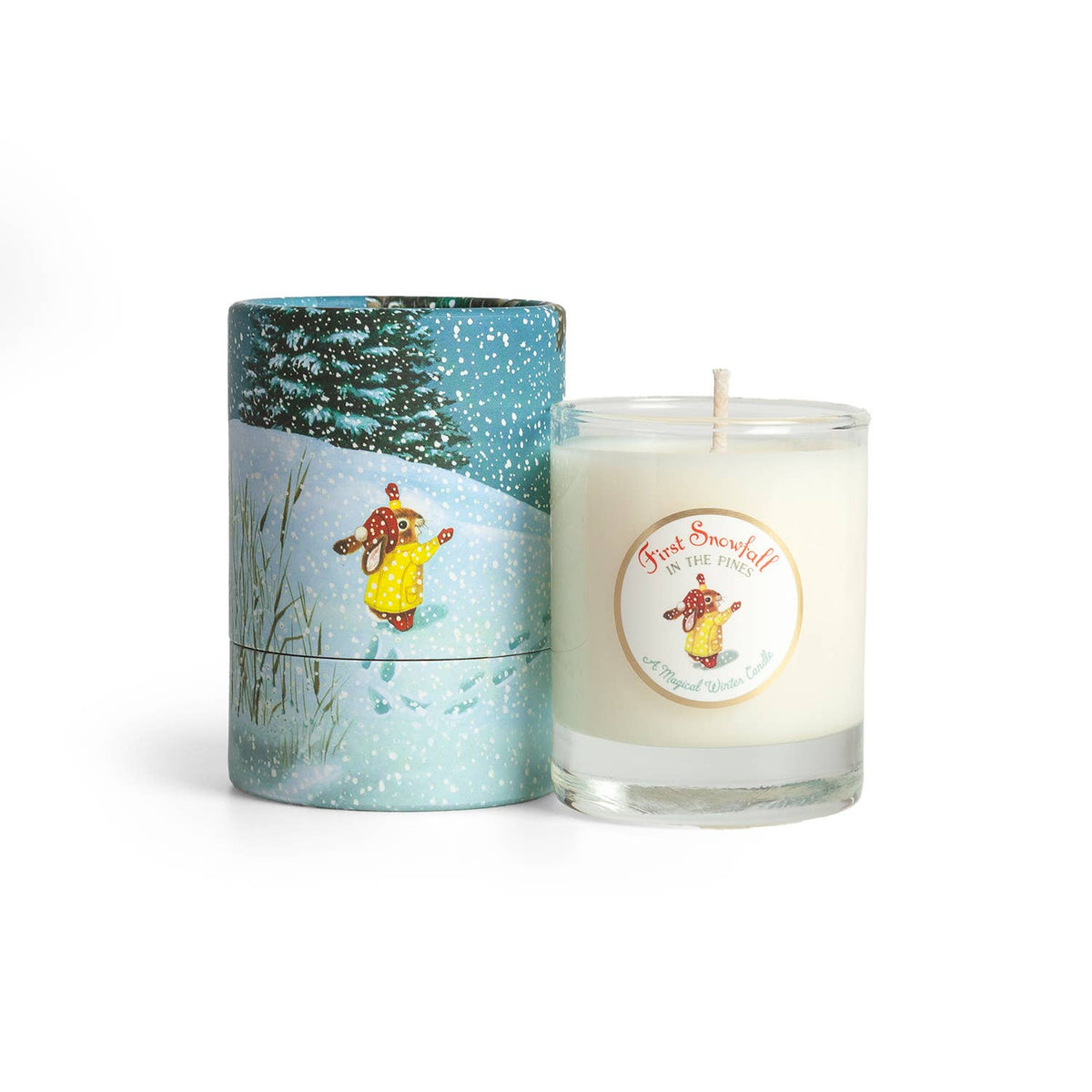 Candle with a decorative label and matching cylindrical container on a white background